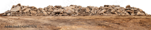 Fotografía Isolated views of concrete debris piles on the ground.