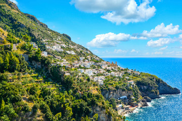 Wall Mural - A view of a hilltop town Praiano from a scenic drive along the Amalfi Coast on the Italian Mediterranean