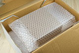 Fototapeta  - Bubbles covering the box by bubble wrap for protection product