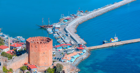 Wall Mural - Landscape with marina and Kizil Kule tower in Alanya peninsula, Antalya district, Turkey