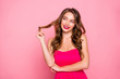 © deagreez - Close up photo amazing beautiful she her lady think over look side empty space hand arm hold winding one curl round finger wear cute shiny colorful dress isolated pink rose bright vivid background