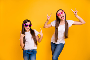 Wall Mural - Close up photo two people beautiful her she diversity lady different age buddies rock concert fans impolite wear colorful specs casual white t-shirts jeans denim isolated yellow bright background