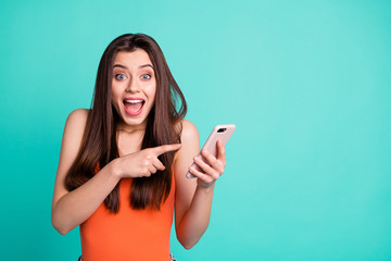 Wall Mural - Portrait cute funky astonished lady impressed unbelievable unexpected incredible notification advice choose decide feedback singlet tank-top orange long hairdo stylish trendy isolated teal background