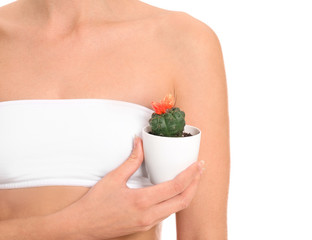 Wall Mural - Beautiful young woman with cactus on white background. Depilation concept