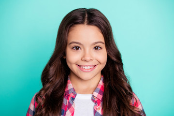 Sticker - Close-up portrait of her she nice attractive lovely winsome sweet cute cheerful cheery wavy-haired pre-teen girl wearing checked shirt isolated on bright vivid shine blue background