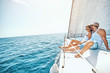 © luckybusiness - Young Couple Relaxing on a Yacht..