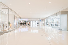 Abstract Blur And Defocused Shopping Mall In Department Store Interior For Background