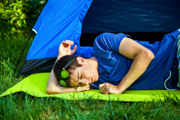 Wall Mural - Young Man sleep outdoor