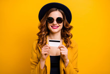 Close Up Photo Beautiful She Her Lady Hold Hands Arms Credit Plastic Card Abroad Vacation Traveler Red Lips Buyer Present Gift  Sale Discount Wear Specs Formal-wear Isolated Yellow Bright Background