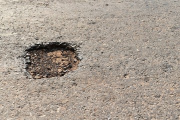 Canvas Print - hole on asphalt road in countryside