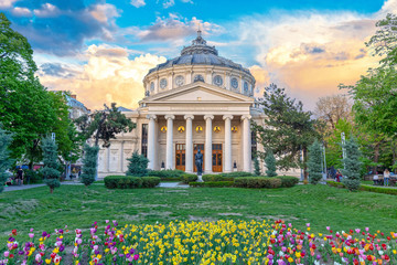 romanian atheneum, an important concert hall and a landmark in bucharest, romania. sunset colors.