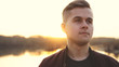 © emaria - Young thoughtful handsome man enjoying sunlight