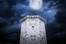 Tower Of Castle At Night In The Moonlight.