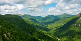 Fototapeta  - Wide view of the Blue Ridge Mountains, seen from Chimney Rock Mountain in North Carolina