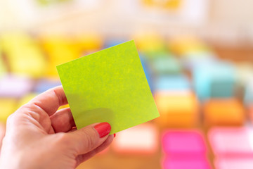 Blank green sticky note with space for text