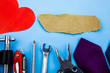 Working tools. Wrench clamps screwdriver tie paper heart piece sandpaper