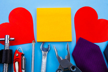 Poster - Front view working tools note pads two paper hearts wrench screwdriver