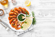 Grilled Tiger Shrimp With Parsley Sauce And Lemon.