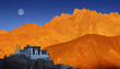 Lamayuru Buddhist monastery, scenic mountain view with full moon and sunset, Ladakh, India