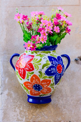 Wall Mural - Wall decorated with flower pots. Valldemossa, old town. Popular tourist destination in Mallorca island, Spain