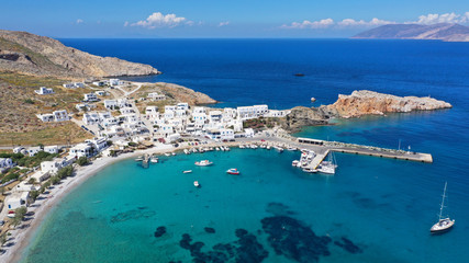 Wall Mural - Aerial drone photo of Karavostasis picturesque main port of Folegandros island featuring sandy pebble beach, Cyclades, Greece