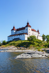 Sticker - White beautiful castle on a hill by a lake