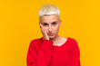 © luismolinero - Teenager girl with white short hair over yellow wall unhappy and frustrated