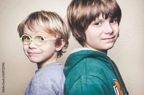 Beautiful Young Boys Posing Together Back To Back Close Up