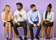 © alfa27 - group of young multinational people sitting and having discussion and waiting for job interview