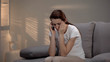 © motortion - Pregnant woman suffering strong headache calling ambulance, female healthcare