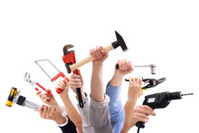 Group Of People's Hand Holding Carpentry Tools