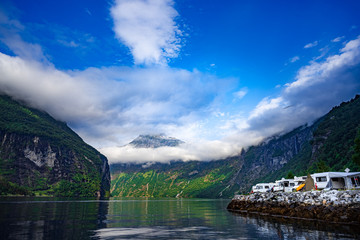 Wall Mural - Geiranger fjord, Norway. Family vacation travel RV, holiday trip in motorhome, Caravan car Vacation.