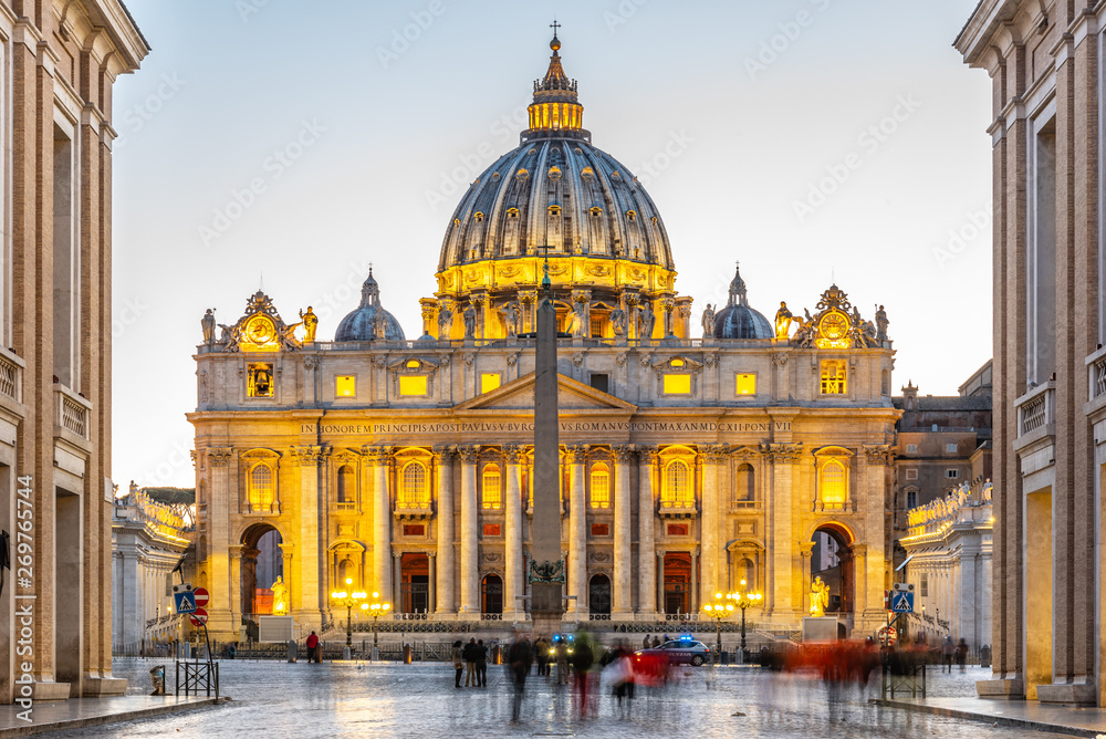 Vatican City by night. Illuminated dome of St Peters Basilica and St Peters Square at the end of Via della Conciliazione. Rome, Italy - obrazy, fototapety, plakaty 