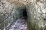 Fototapeta Na drzwi - View inside a mountain cave at the sea.