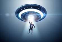 Flying Saucer Abducting Young Businessman 