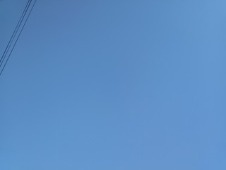 Wall Mural - clear blue sky background and empty space for your design, no cloud.