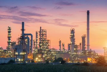 Industrial view Oil refinery and oil tanks plant during at twilight