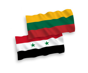 National vector fabric wave flags of Lithuania and Syria isolated on white background. 1 to 2 proportion.