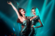 © Subbotina Anna - Hot model girls dancing in UV neon lights. Disco party. Sexy young women with perfect slim bodies dancing. Night life