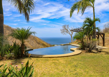 View Of The Pacific Ocean From And Infinity Pool In Coasta Rica
