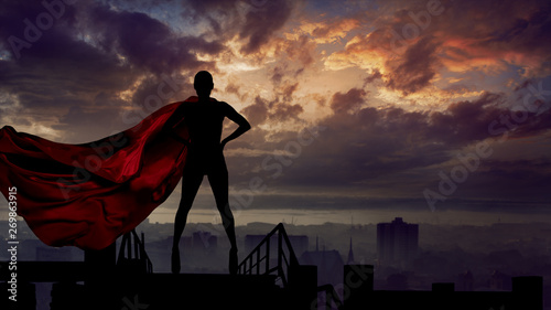 Fotomural Portrait of young hero woman with super person red cape guard city