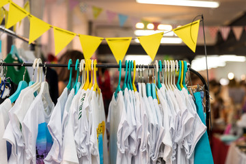 Sticker - Clothes on the rail on the summer outdoor vintage fashion designer market