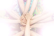 © Валерий Моисеев - Group of children putting their hands together. Concept teamwork partnership
