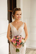 © Wedding photography - Portrait of beautiful bride with wedding bouquet