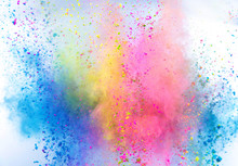 Colored Powder Explosion On White Background. Freeze Motion.