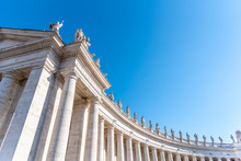 Doric Colonnade With Statues Of Saints On The Top. St. Peters Square, Vatican City