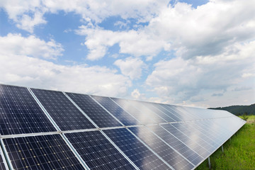 Solar Power Station on the spring Meadow 