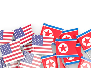 Wall Mural - Pins with flags of United States and north korea isolated on white