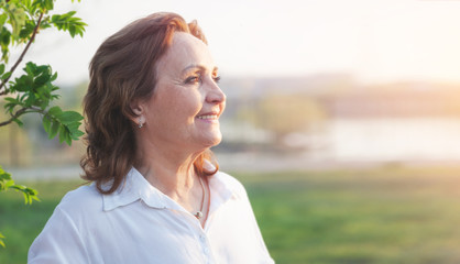 Beautiful happy smiling elderly woman closeup portrait, happy pension concept.