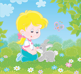 Smiling little girl playing with her small grey bunny among flowers on green grass on a summer day, vector illustration in a cartoon style